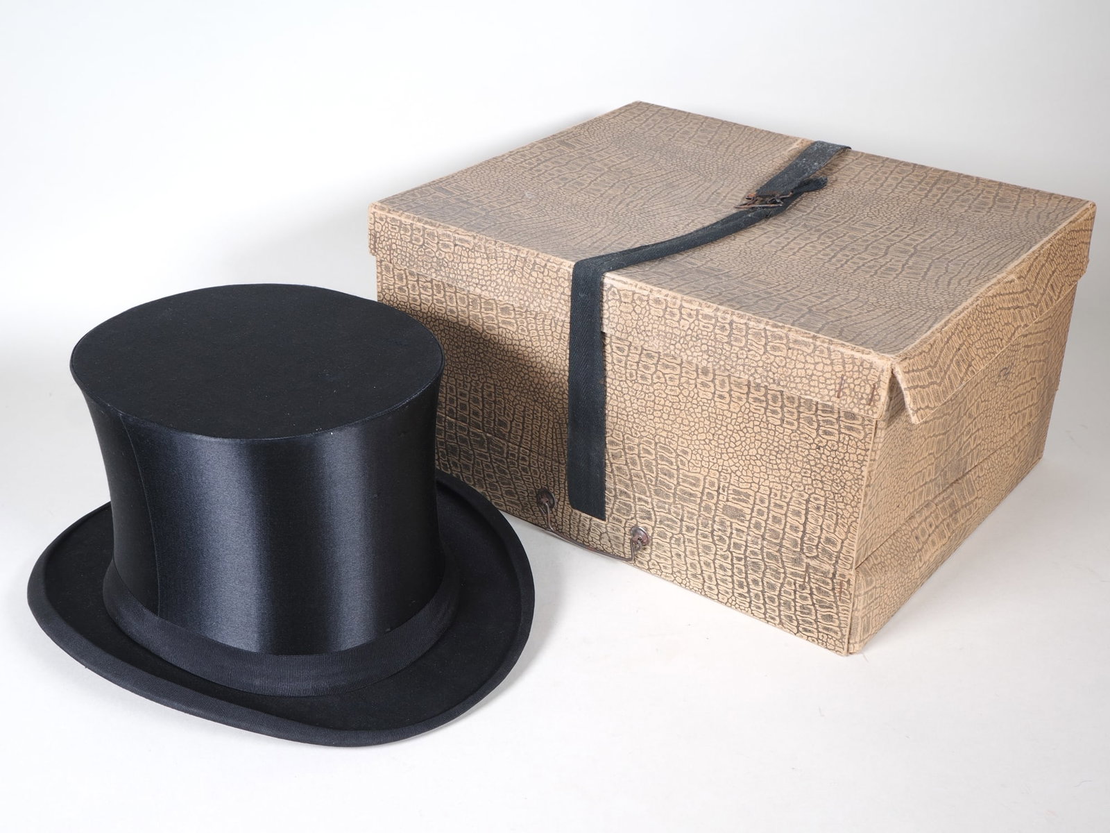 Folding top hat in box, circa 1900 (1 of 2)