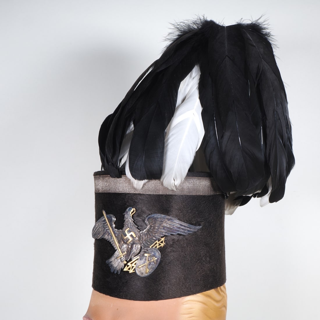3rd Reich miner's uniform shaft hat with plume, 1933: 3rd Reich miner's uniform shaft hat with plume, 1933Extremely rare miner's hat in shako form, body made of cardboard covered with fine fur-like fabric on the outside, large Prussian eagle with swastik