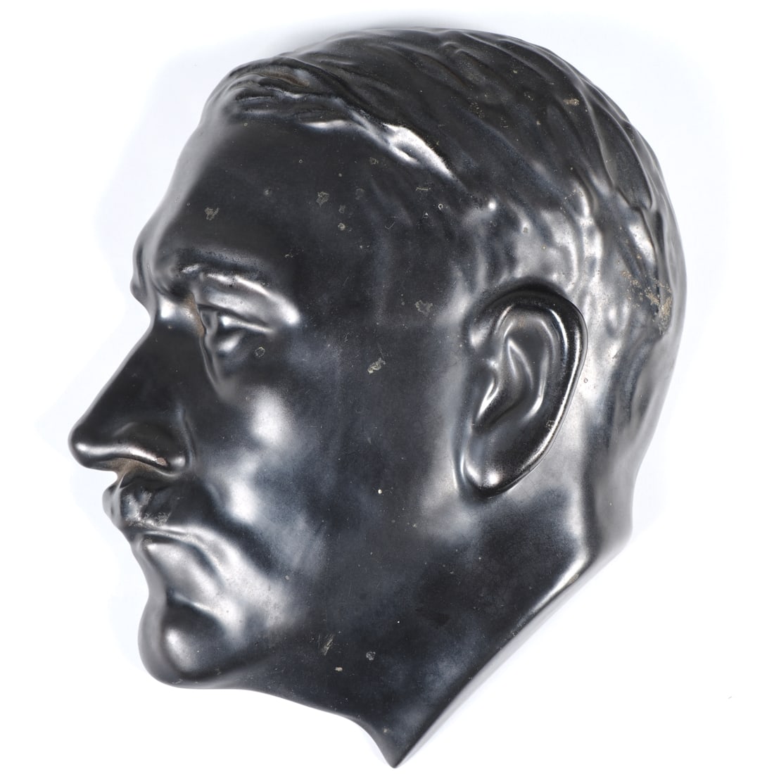 Meissen "Adolf Hitler" ceramic wall relief, circa 1934: Meissen "Adolf Hitler" ceramic wall relief, circa 1934 Very rare wall relief depicting a portrait of Adolf Hitler. Made of ceramic, black glazed on the front, hollow inside with the manufacturer's mar