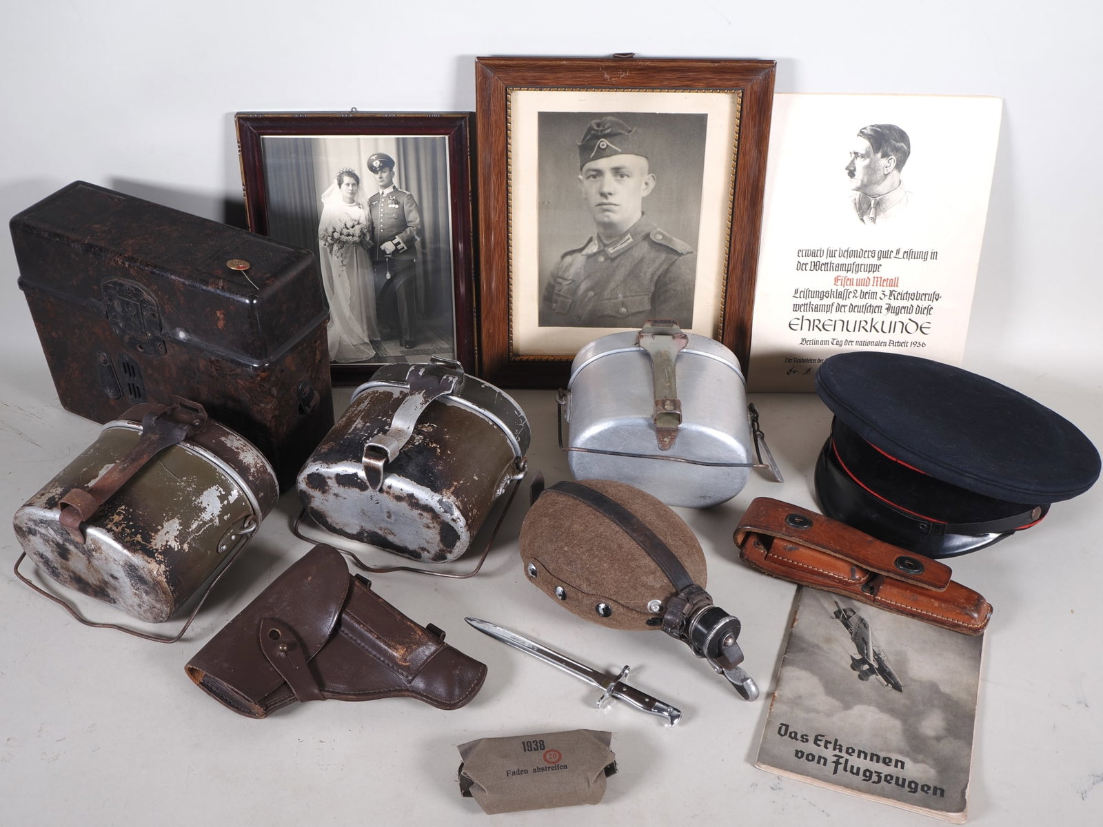 Collection of Wehrmacht militaria, field telephone, canteen, mess kit, etc. (1 of 2)