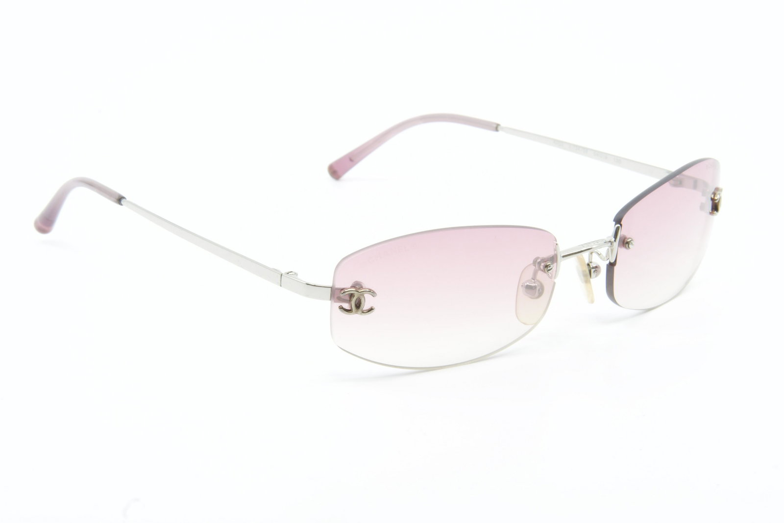 Chanel Pink Fade Square Sungalsses: Slight wear, Discoloraton, Small Rips, and scratches