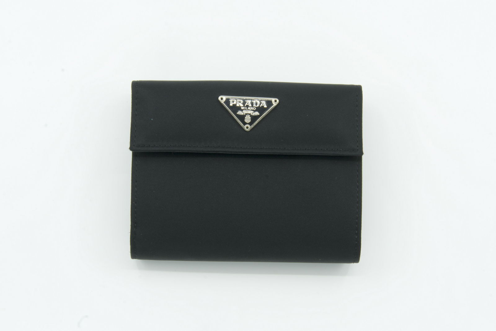 Prada Tessuto Black Wallet: Slight wear, Discoloraton, Small Rips, and scratches