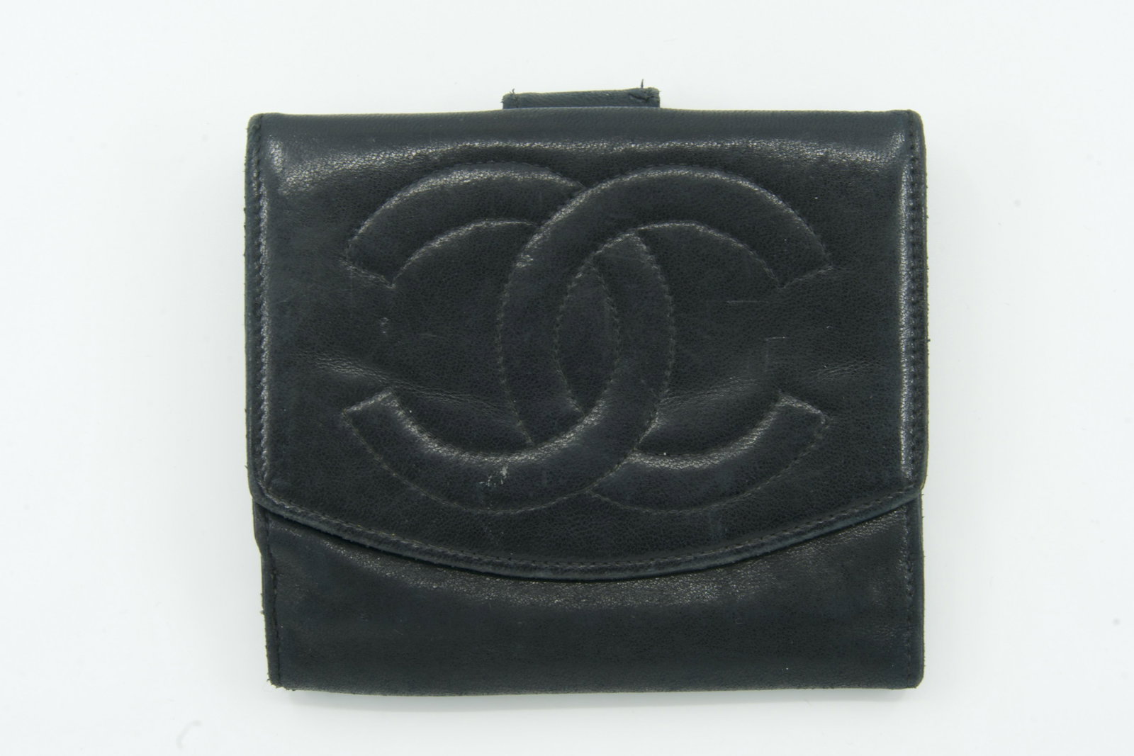 Chanel Lambskin Wallet: Slight wear, Discoloraton, Small Rips, and scratches