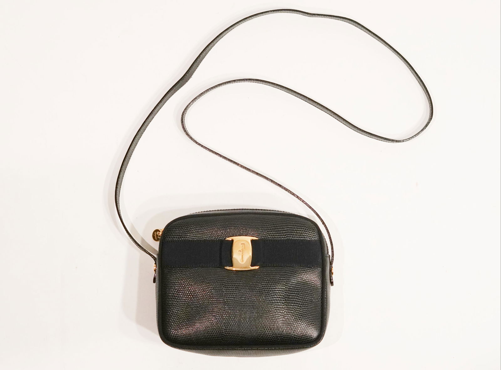 Ferragamo Vara Leather Crossbody: Slight wear, Discoloraton, Small Rips, and scratches