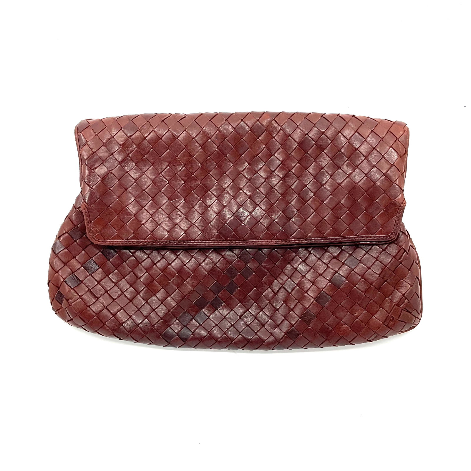 Bottega Veneta Cluch: Slight wear, Discoloraton, Small Rips, and scratches