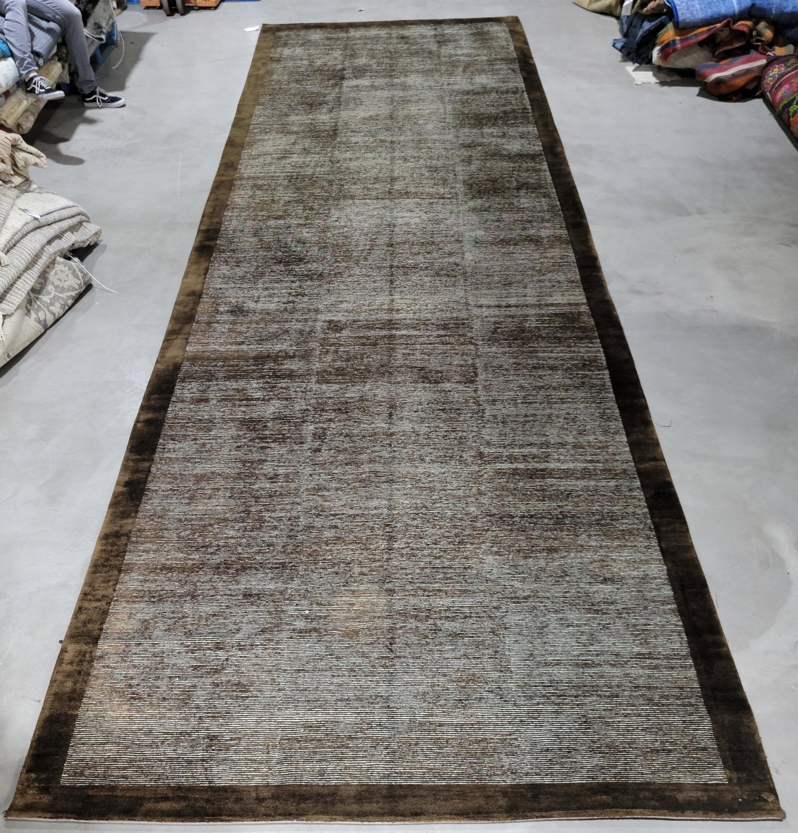 Modern Chenille Nepalese 7'3'' x 22'10'' Rug: Hand knotted chenille 7'3'' x 22'10'' wool and silk rug made in Nepal. Brown and ivory striation all over with solid brown border. Note: All items in this auction are as-is.