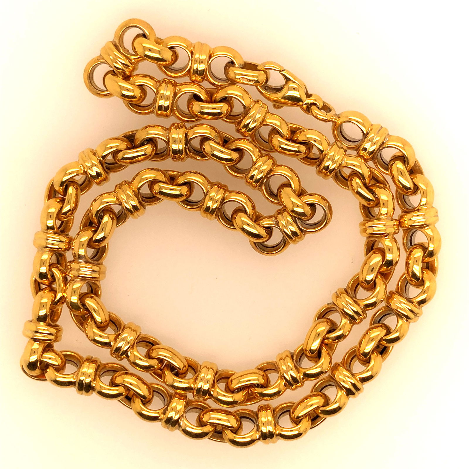 18 K yello Gold Chopard Necklace: It weighs 47.2 grams Stamped on clasp 16" long