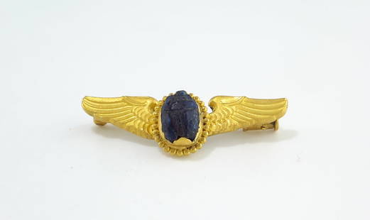 22K Gold Pin Set with Ancient Black Stone – 26th Dynasty, Egypt (circa 600 B.C.): 22K Gold Pin Set with Ancient Black Stone – 26th Dynasty, Egypt (circa 600 B.C.)This exquisite pin set features authentic 22 karat gold delicately fashioned around a rare ancient black stone,
