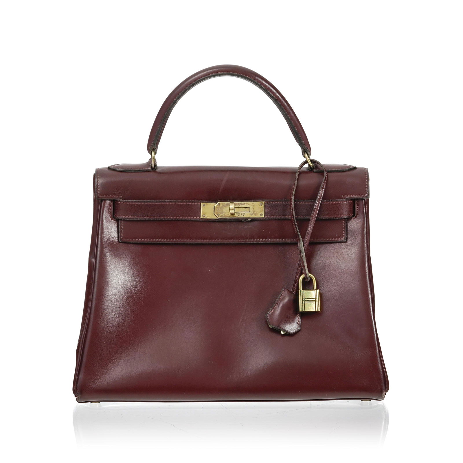 Hermès, sac Kelly 28 retourné en cuir de Box bordeaux, année 1960, bouclerie (1 of 3)