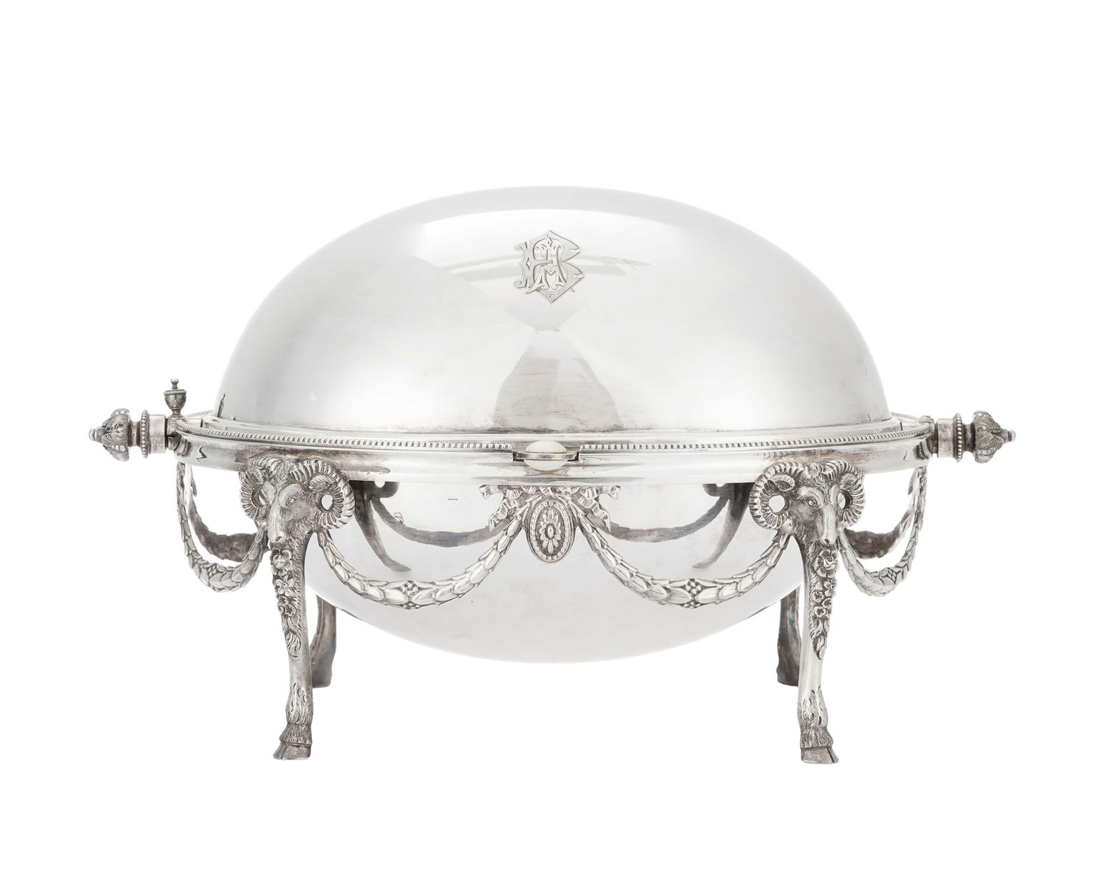 Dôme de petit-déjeuner en métal argenté, XXe s., à décor de guirlandes: Dôme de petit-déjeuner en métal argenté, XXe s., à décor de guirlandes de feuilles de laurier et médaillons, la bordure perlettes et les pieds têtes de bouc,