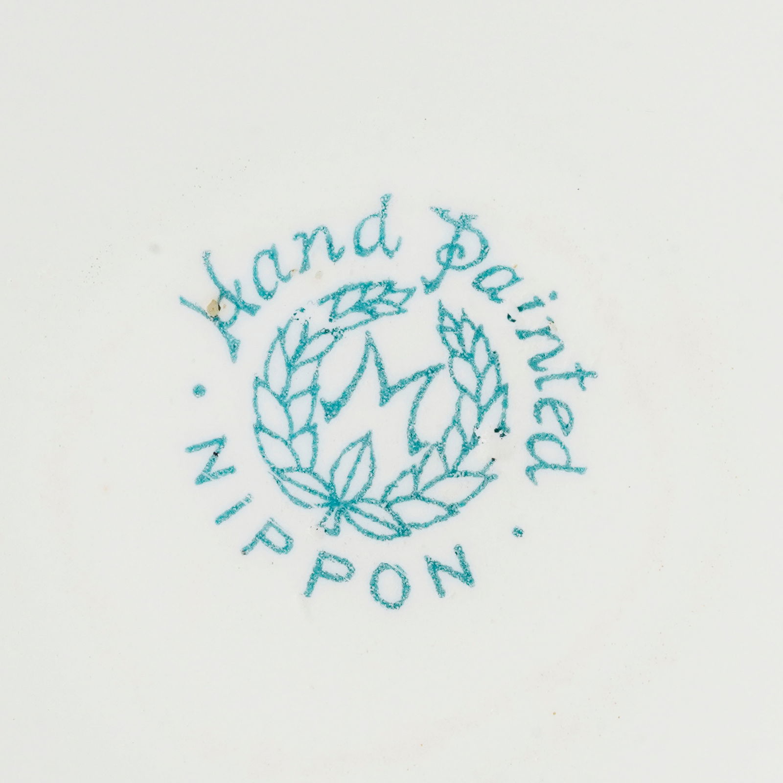 Ensemble de 9 assiettes et 1 plat ovale en porcelaine, marque Nippon, à décor polychrome d - 3