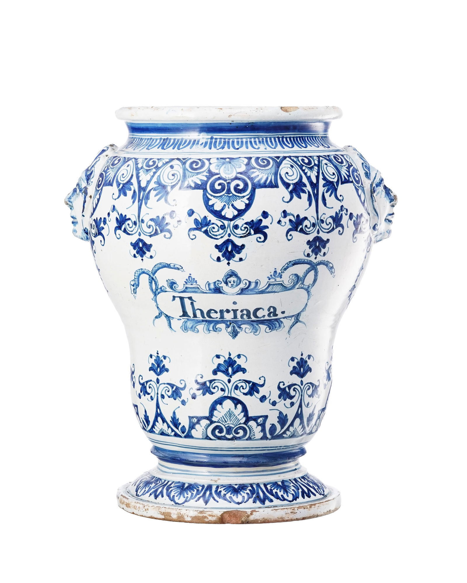 Grand pot à pharmacie en faïence de Nevers ou Rouen, XVIIIe s., à décor bleu de : Grand pot à pharmacie en faïence de Nevers ou Rouen, XVIIIe s., à décor bleu de feuillage et inscription "Theriaca", h. 45 cm Conditionmanques et éclats dus à l'usage