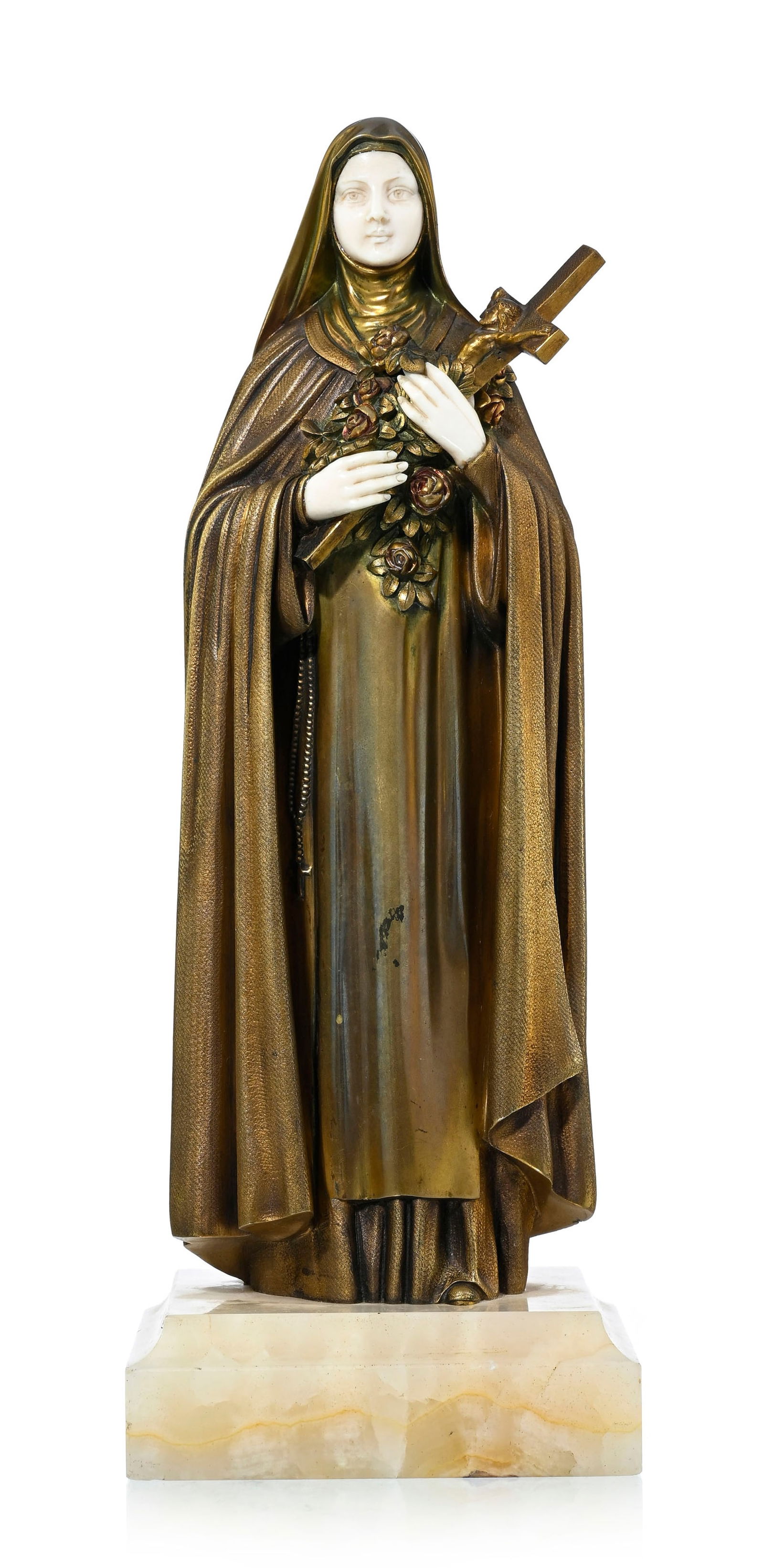 Sainte-Thérese de Lisieux, sculpture en bronze doré et ivoire signée H Chiparus (1886: Sainte-Thérese de Lisieux, sculpture en bronze doré et ivoire signée H Chiparus (1886-1947), h. 32,5 cm In: Alberto Shayo, Chiparus maître de l'art déco, 2016, p. 225. Veuille