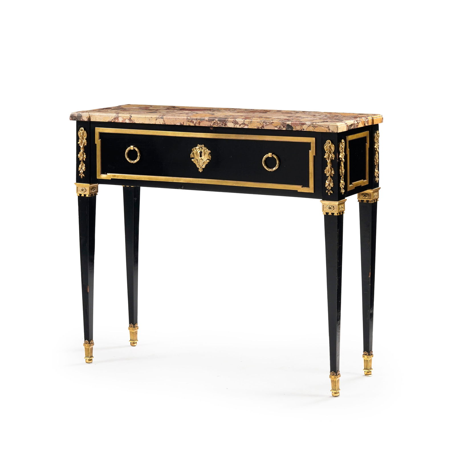 Desserte de style Louis XVI attribuée à la maison Jansen, XXe s., en bois laqué noir : Desserte de style Louis XVI attribuée à la maison Jansen, XXe s., en bois laqué noir et ornementations en bronze doré, ouvrant par un tiroir en façade, plateau en marbre br