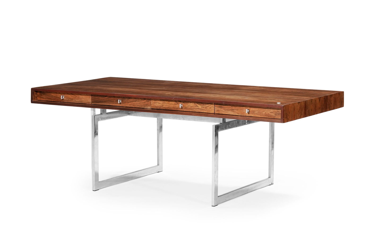 Bureau 901 par Bodil Kjaer (née en 1932), Danemark, circa 1960, en placage de palissandre, ouvr: Bureau 901 par Bodil Kjaer (née en 1932), Danemark, circa 1960, en placage de palissandre, ouvrant par quatre tiroirs en ceinture, piétement en métal chromé, modèle