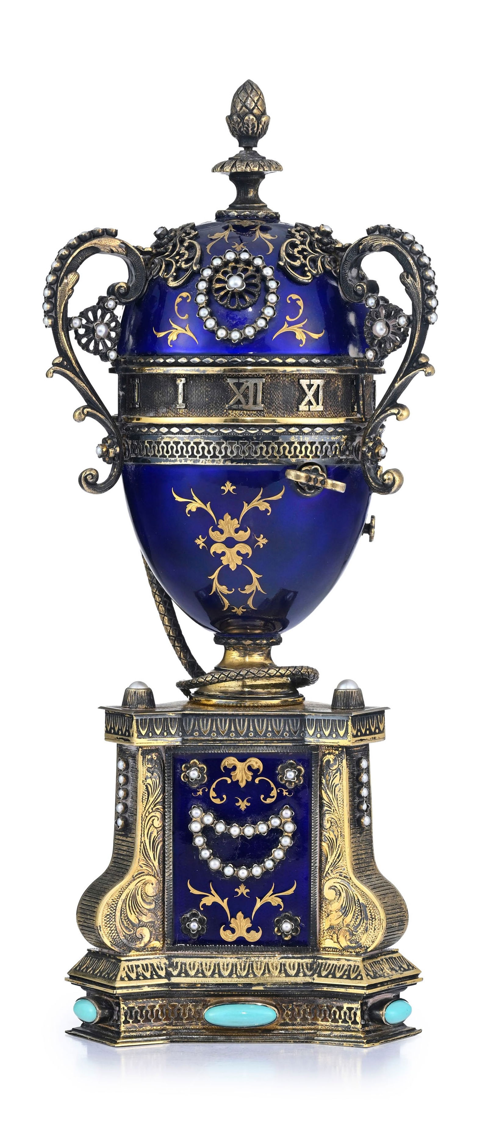 Horloge à cercle tournant en forme d’œuf, avec boîte à musique, XXe s., da - 2