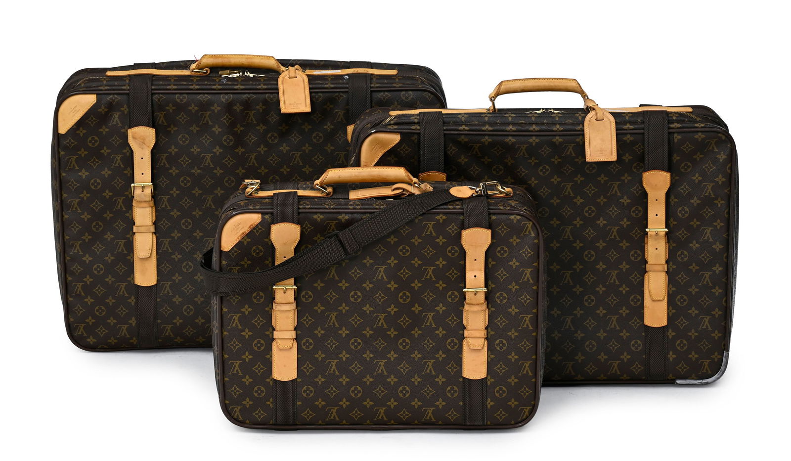 Louis Vuitton, suite de 3 valises Satellite en toile enduite Monogram et cuir naturel, portes les in (1 of 8)
