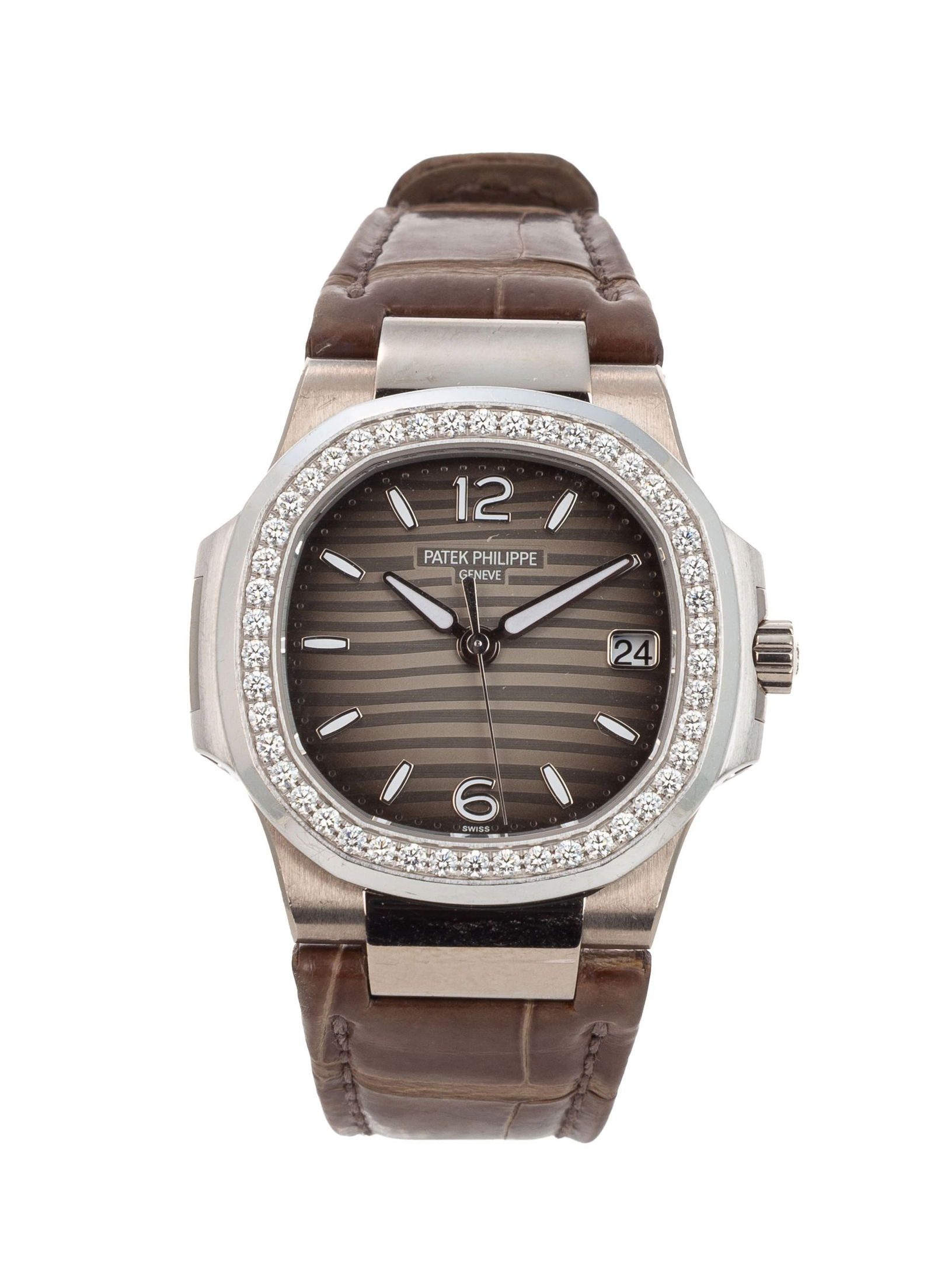 Patek Philippe, Nautilus, réf. 7010G-012, montre en or gris 750 sertie de diamants, circa 2015 : Patek Philippe, Nautilus, réf. 7010G-012, montre en or gris 750 sertie de diamants, circa 2015 Mouvement: cal. E23-250 S C, quartz, 8 rubis, n°5902458 Boîtier: n°6029784, larg. 34