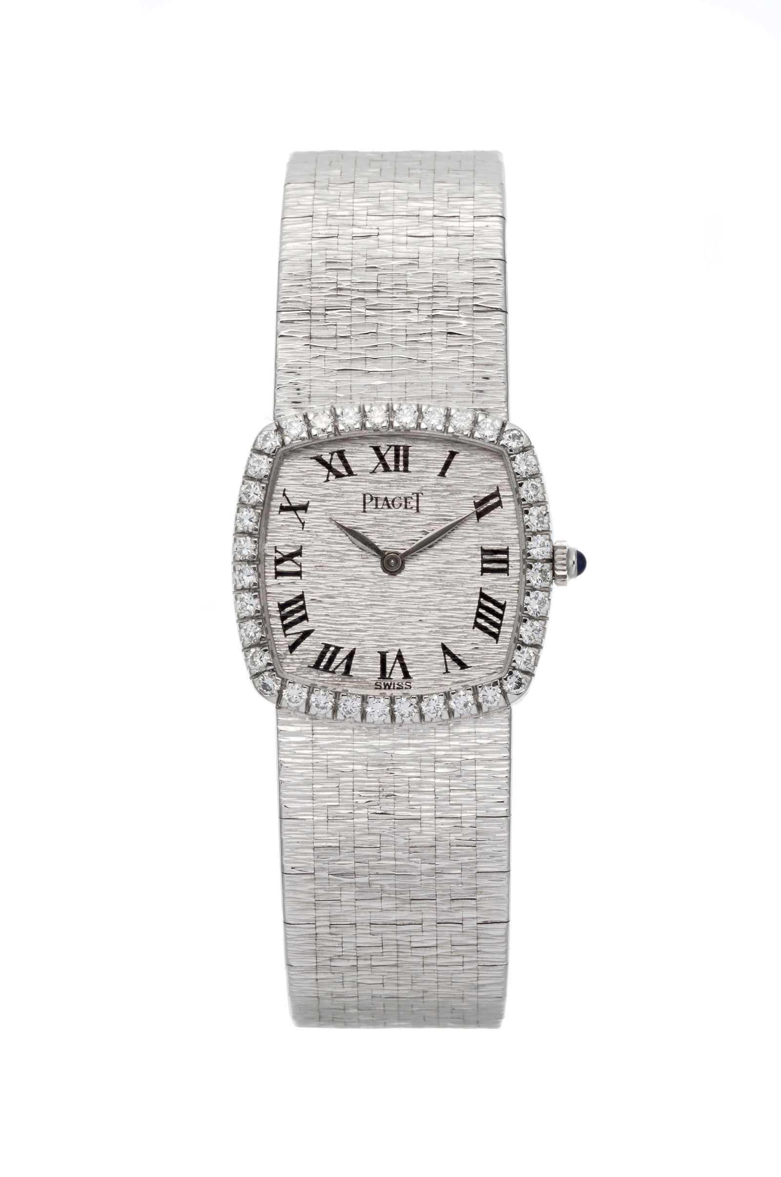 Piaget, réf. 9236 A 6, montre-bracelet en or gris 750 sertie de diamants, années 1970 Mo: Piaget, réf. 9236 A 6, montre-bracelet en or gris 750 sertie de diamants, années 1970 Mouvement: cal. 9P, mécanique, 18 rubis, n°7314804 Boîtier: n°234302, larg. 23 mm