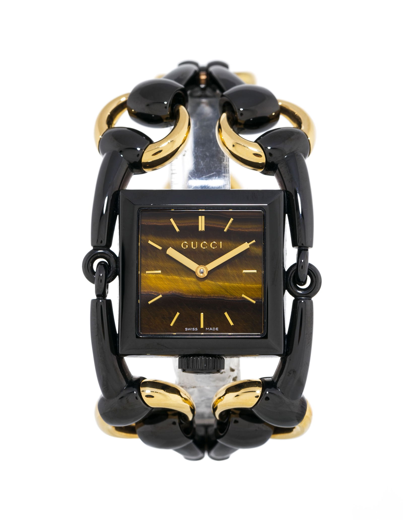 Gucci, Signoria, réf. 116.3, montre-bracelet en métal noirci et doré ornée d'un : Gucci, Signoria, réf. 116.3, montre-bracelet en métal noirci et doré ornée d'un cadran en œil-de-tigre Mouvement: quartz Boîtier: n°11736061, larg. 36 mm Signature: