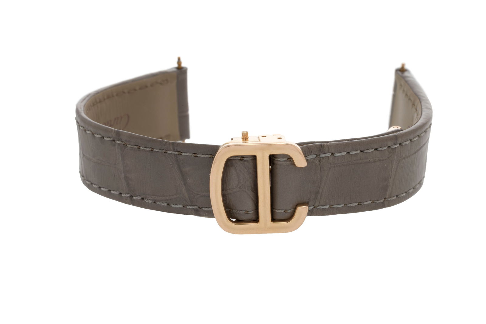 Cartier, boucle déployante en or rose 750 avec son bracelet en croco gris, signé, larg. ex: Cartier, boucle déployante en or rose 750 avec son bracelet en croco gris, signé, larg. extrémités du bracelet 15.5 mm, poids de la boucle sans bracelet 13g Veuillez noter que