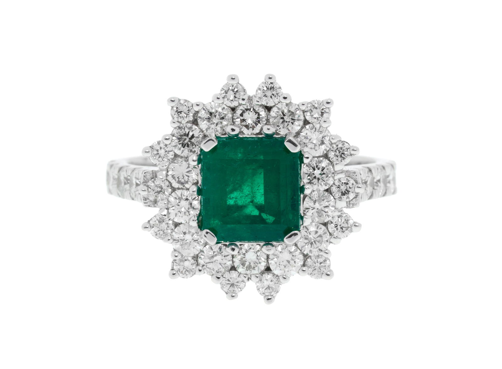 Bague or gris 585 sertie d'une émeraude octogonale entourée de diamants taille brillant, d: Bague or gris 585 sertie d'une émeraude octogonale entourée de diamants taille brillant, doigt 56-16 ConditionMonture: Très bon état de conservation général.