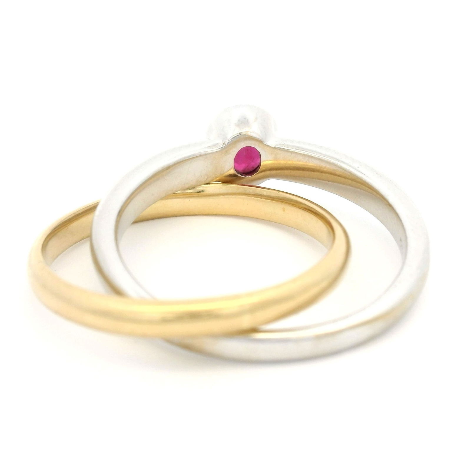 Bucherer, bague formée de deux anneaux en or gris et jaune 750, l'un serti d'un rubis taille ov - 3