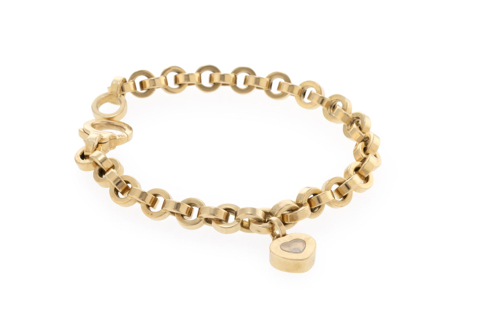 Chopard, Happy Diamonds, bracelet or 750 à maille forçat retenant un charm cœur reten: Chopard, Happy Diamonds, bracelet or 750 à maille forçat retenant un charm cœur retenant un diamant entre deux plaques de verre, signé, numéroté, long. 19 cm, 26g,