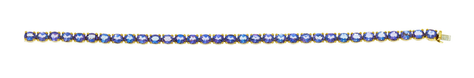 Bracelet rivière or 750 serti de tanzanites ovales, long. 18 cm, 18g: Bracelet rivière or 750 serti de tanzanites ovales, long. 18 cm, 18g ConditionTrès bon état de conservation général. 