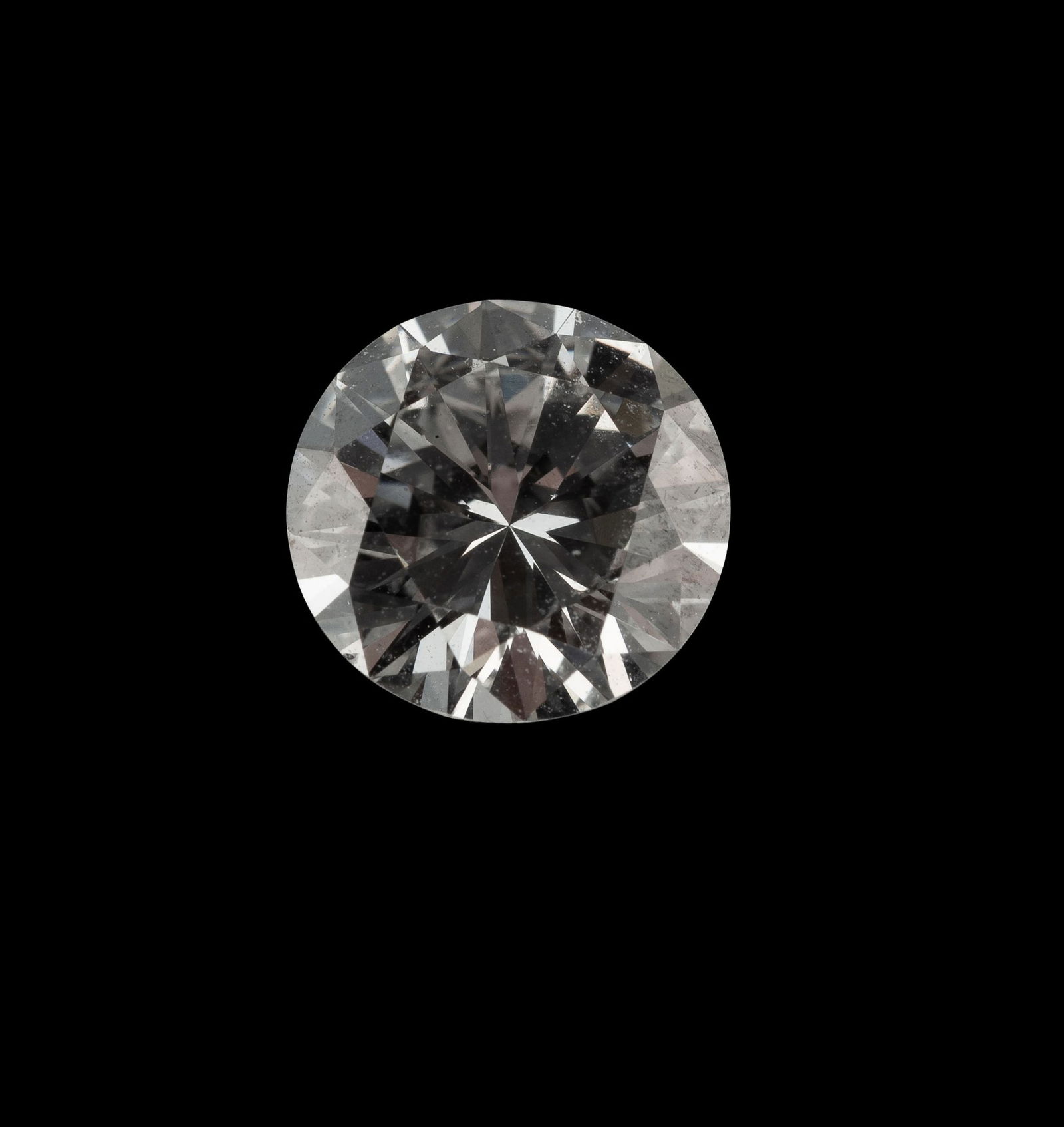 Un diamant taille brillant sur papier de 1.53 carat: Un diamant taille brillant sur papier de 1.53 carat A brilliant-cut diamond on paper, weighing 1.53 carats. Condition7.68x7.66x4.45 mm VS2 (un petit éclat sur le rondiste) H Fluo: