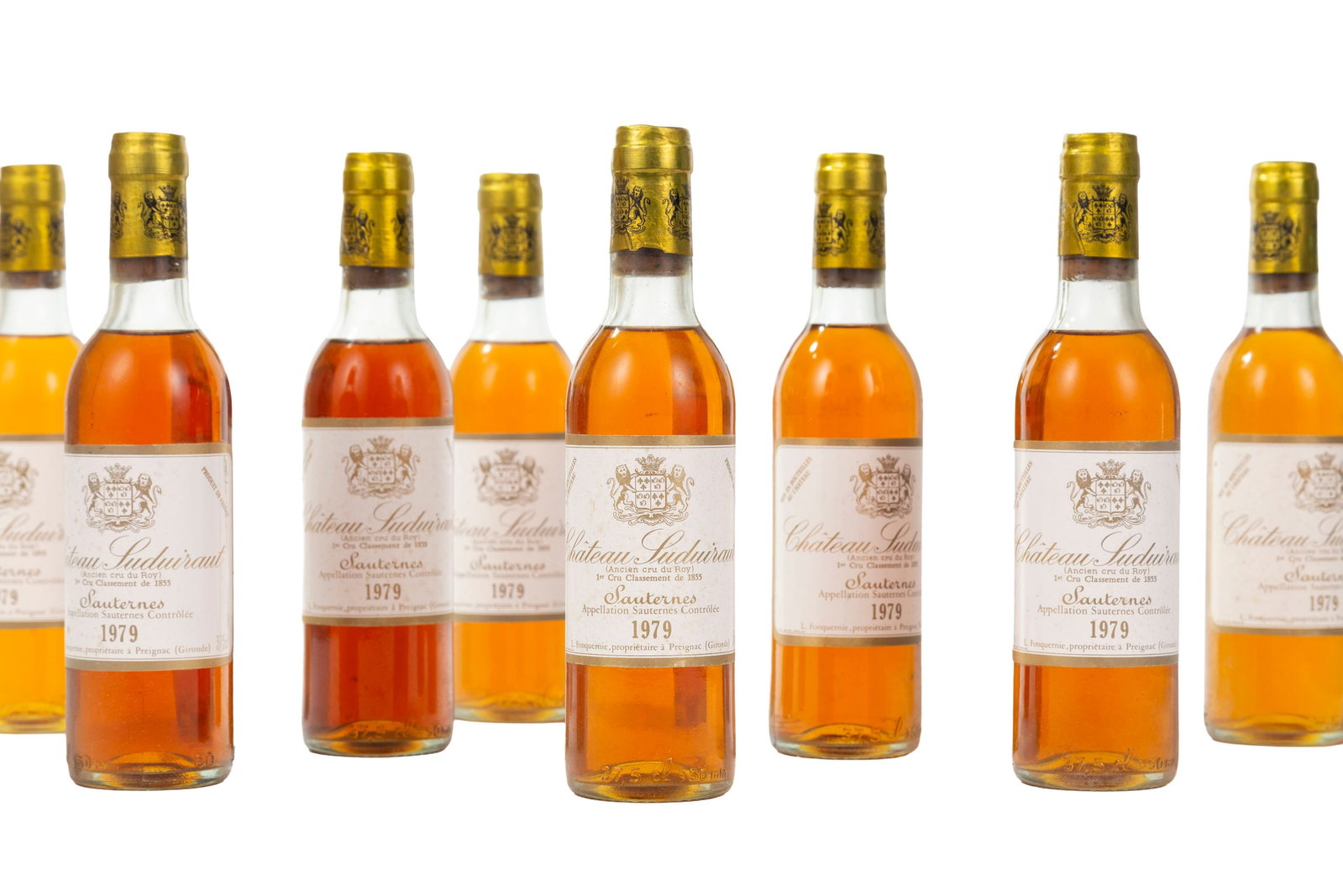 Ch. Suduiraut, 1979, Sauternes, 1er grand cru classé, 8 1/2 bts: Ch. Suduiraut, 1979, Sauternes, 1er grand cru classé, 8 1/2 bts Condition niveau très légèrement bas et haute épaule