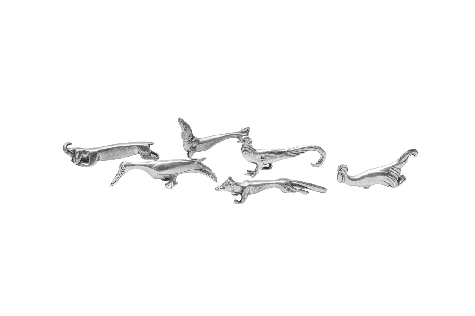 Suite de 6 porte-couteaux animaux en métal argenté, XXe s., divers poinçons dont Gall: Suite de 6 porte-couteaux animaux en métal argenté, XXe s., divers poinçons dont Gallia et WMF, long. env. 8 cm Condition 1 patte de coq manquante