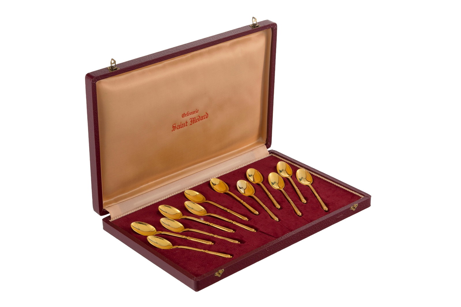 Ensemble de 24 cuillers en métal doré, XXe s., 2 modèles dont Saint-Médard, long - 2