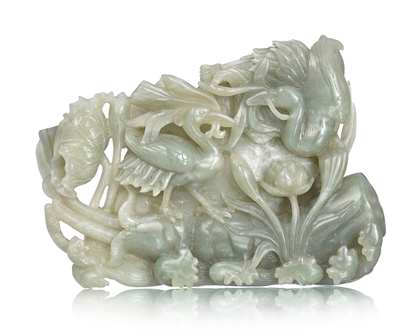 Oiseaux parmi lotus, sculpture en jade, Chine, l. 16 cm Provenance: achat chez Piguet Hôtel d: Oiseaux parmi lotus, sculpture en jade, Chine, l. 16 cm Provenance: achat chez Piguet Hôtel des Ventes, Genève, 19 septembre 2023, lot 3506. Collection Jean-Claude Cottet A jade carving of