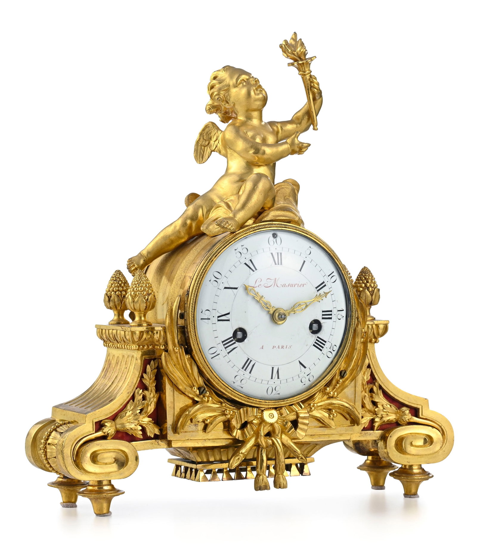 Pendule d'époque Louis XVI, en bronze ciselé et doré, cadran signé Le Masurier &: Pendule d'époque Louis XVI, en bronze ciselé et doré, cadran signé Le Masurier à Paris et surmonté d'un angelot tenant une flamme, 32x29x12 cm