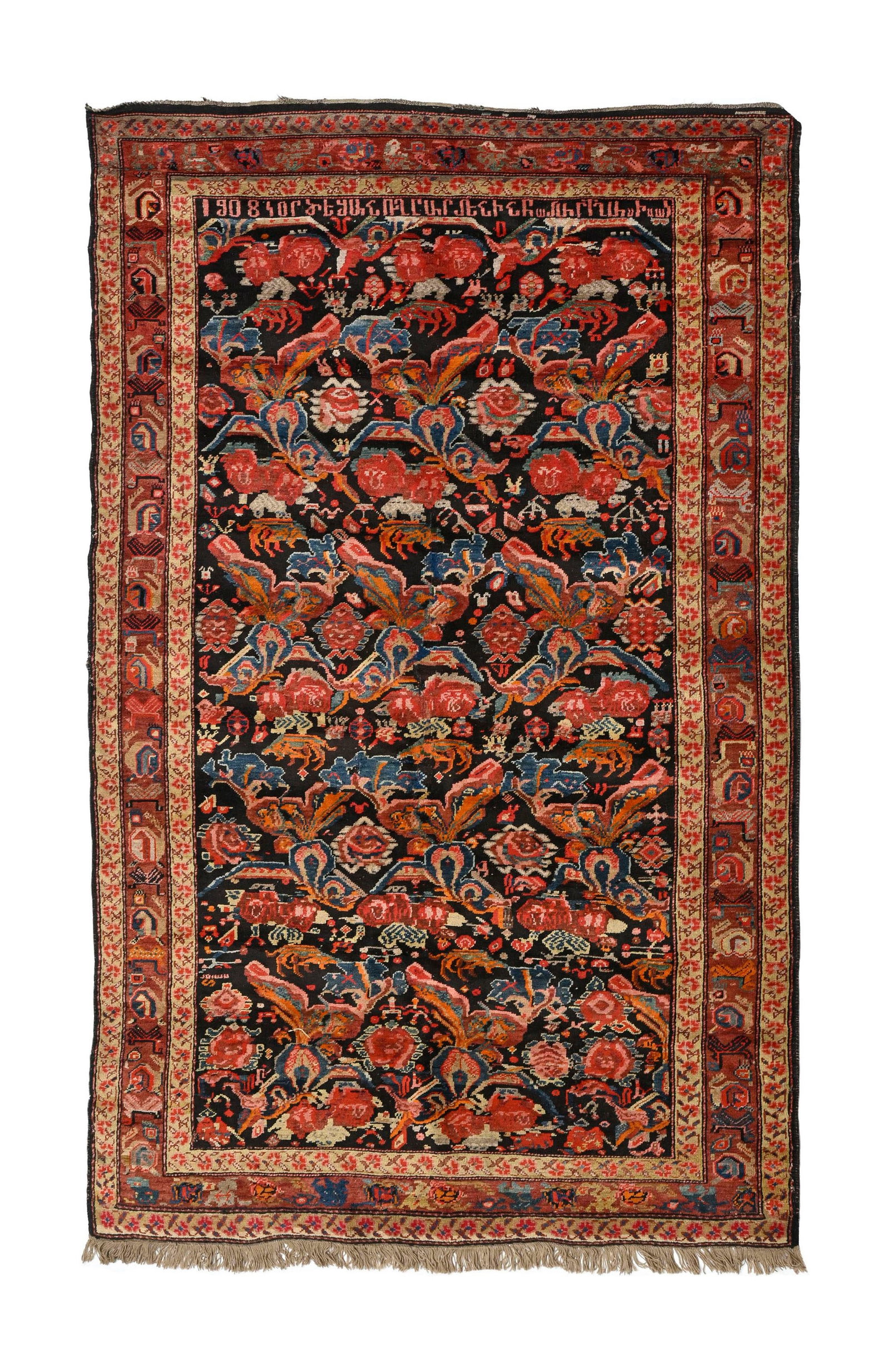 Tapis Karabagh, Caucase, 1er quart du XXe s., à semis de fleurs stylisées polychromes sur : Tapis Karabagh, Caucase, 1er quart du XXe s., à semis de fleurs stylisées polychromes sur fond noire, bordure rouge, signé et daté 1908, 161x260 cm