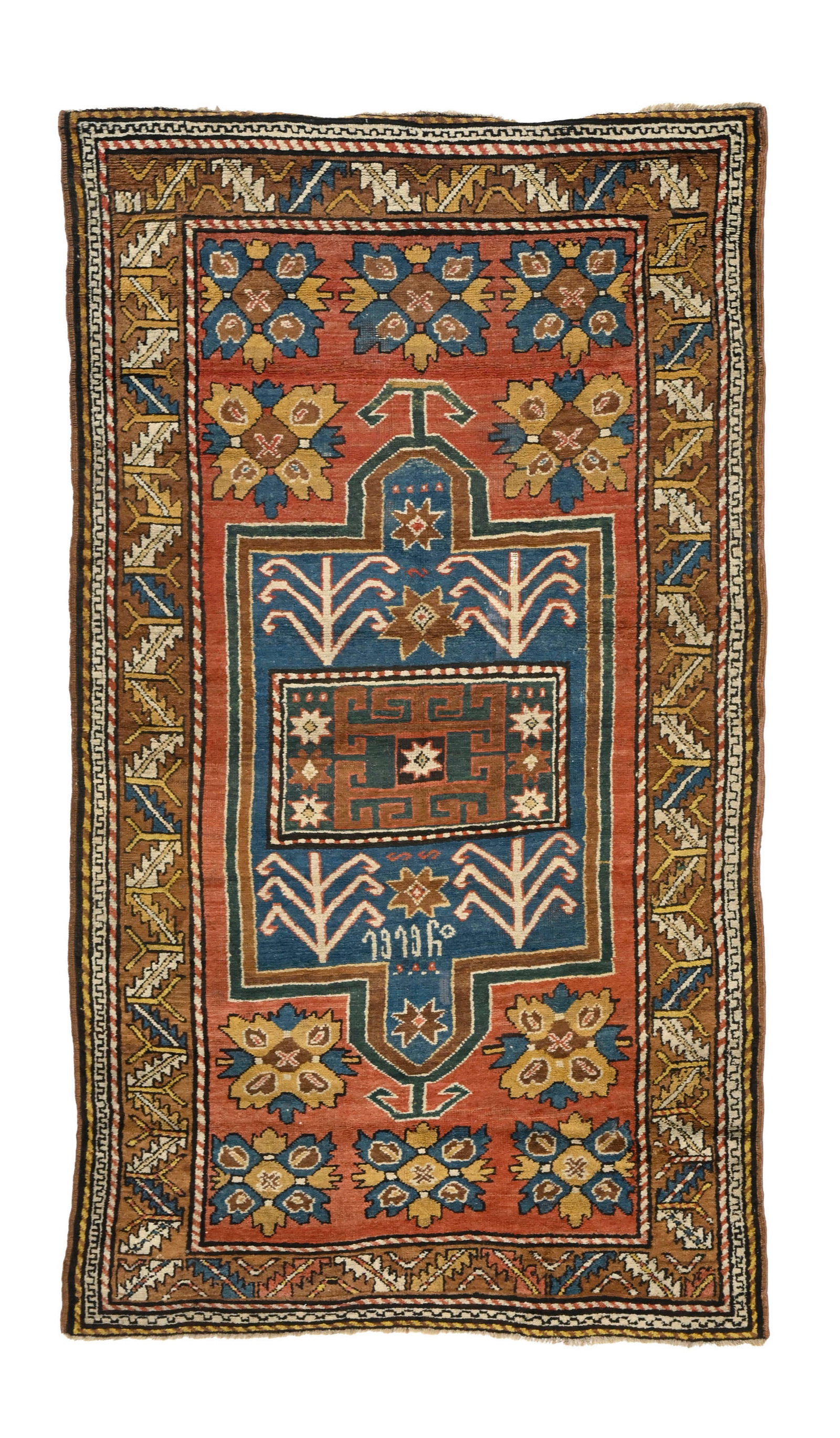 Tapis Kazakh, Caucase, 1er tiers du XXe s., à double mihrab central bleu sur fond rouge à : Tapis Kazakh, Caucase, 1er tiers du XXe s., à double mihrab central bleu sur fond rouge à semis de fleurs stylisées, bordure brune ornée d'une frise de feuilles stylisées,