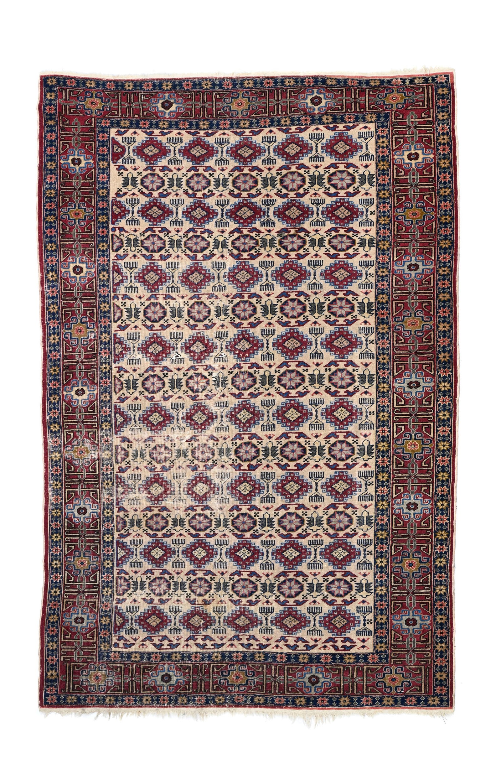 Tapis Shirvan, Caucase, début du XXe s., à semis de médaillons polychromes sur fond b: Tapis Shirvan, Caucase, début du XXe s., à semis de médaillons polychromes sur fond beige, bordure rouge à motifs coufiques, 124x178 cm Condition Usures sur certaines zones du tapi
