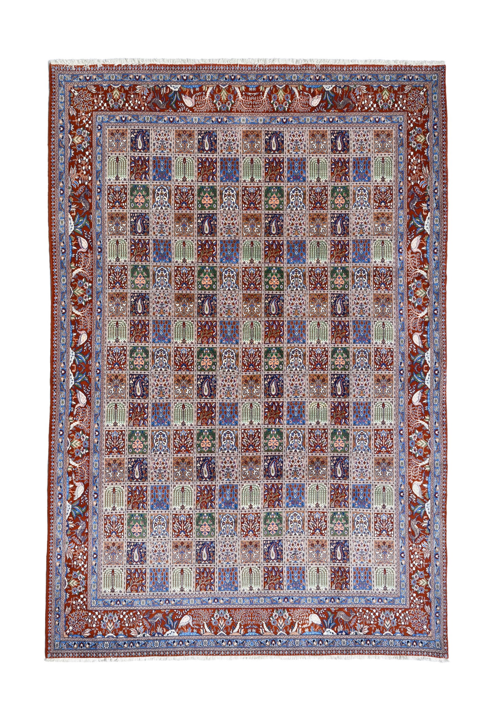 Tapis en laine avec soie, Inde, 2ème moitié du XXe s., à décor de jardins d'Orie: Tapis en laine avec soie, Inde, 2ème moitié du XXe s., à décor de jardins d'Orient inscrits dans des cases polychromes, bordure rouge brique ornée de fleurs et d'animaux