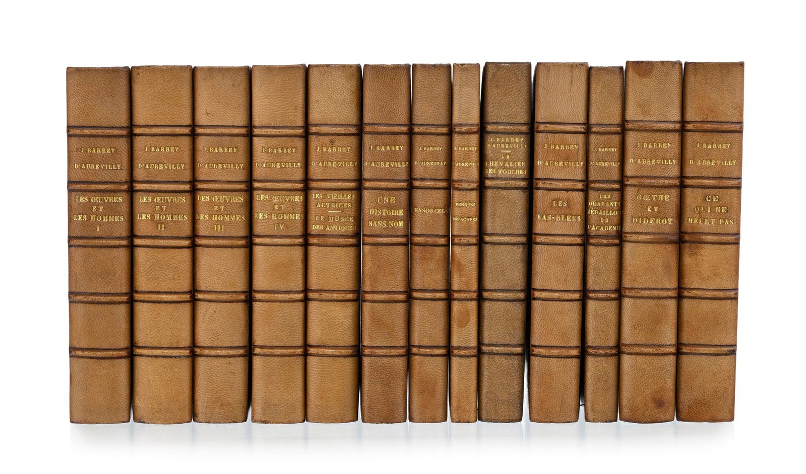 BARBEY D'AUREVILLY (Jules). Diverses œuvres en édition originale. 10 ouv. en 13 vol. reli&: BARBEY D'AUREVILLY (Jules). Diverses œuvres en édition originale. 10 ouv. en 13 vol. reliés plein maroquin aubergine, dos à nerfs, filet doré aux coupes, roulette dorée e