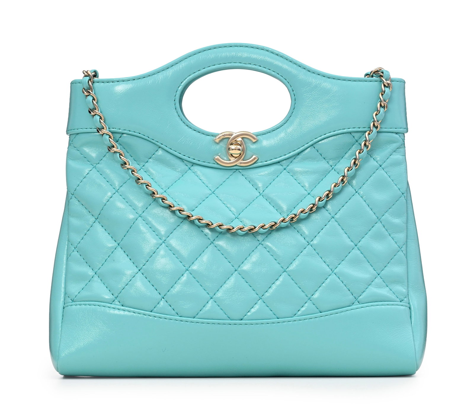 Chanel, sac 31 Mini Tote en cuir brillant turquoise, double bandoulière en cuir simple et à: Chanel, sac 31 Mini Tote en cuir brillant turquoise, double bandoulière en cuir simple et à chaînette et cuir entrelacé, housse, 23x20 cm Condition Très bon état de