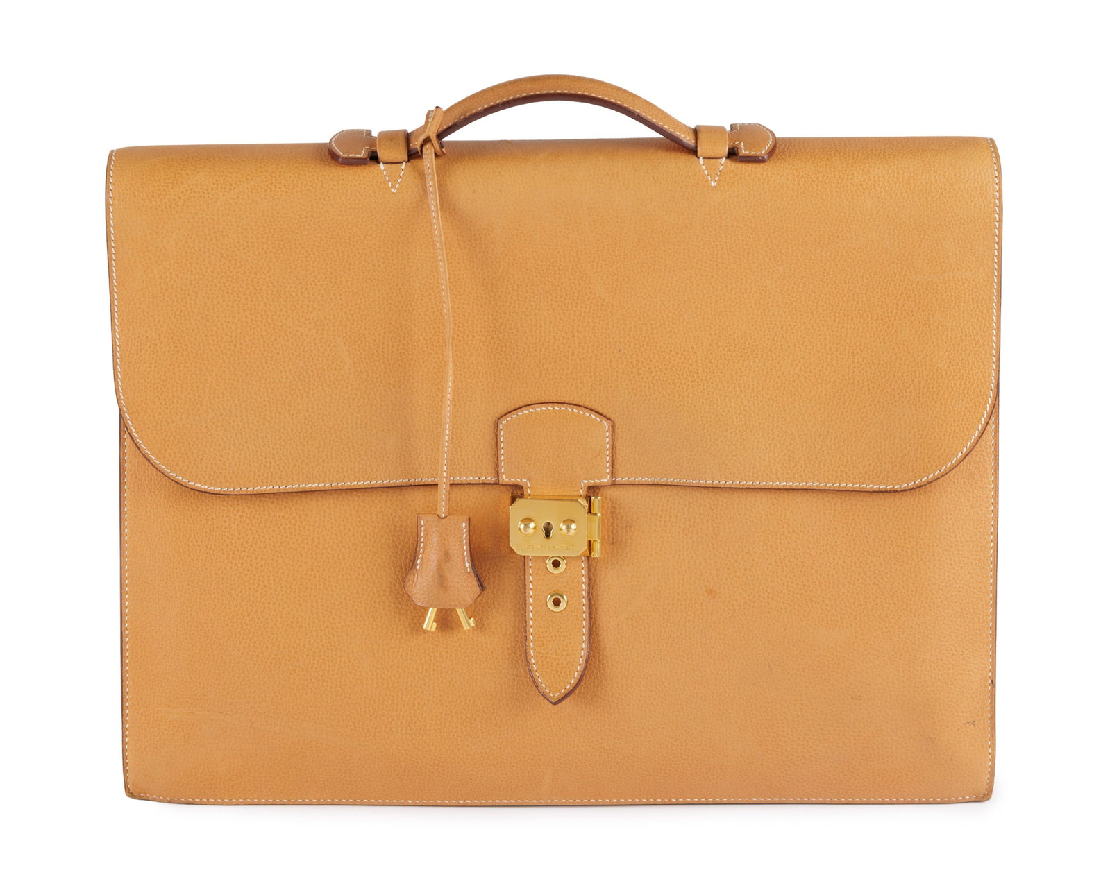Hermès, sac à dépêches en cuir Courchevel Gold, année 2004, à deux sou: Hermès, sac à dépêches en cuir Courchevel Gold, année 2004, à deux soufflets, tirette et clochette avec 2 clefs, bouclerie plaquée or, housse, 30x38 cm Condition