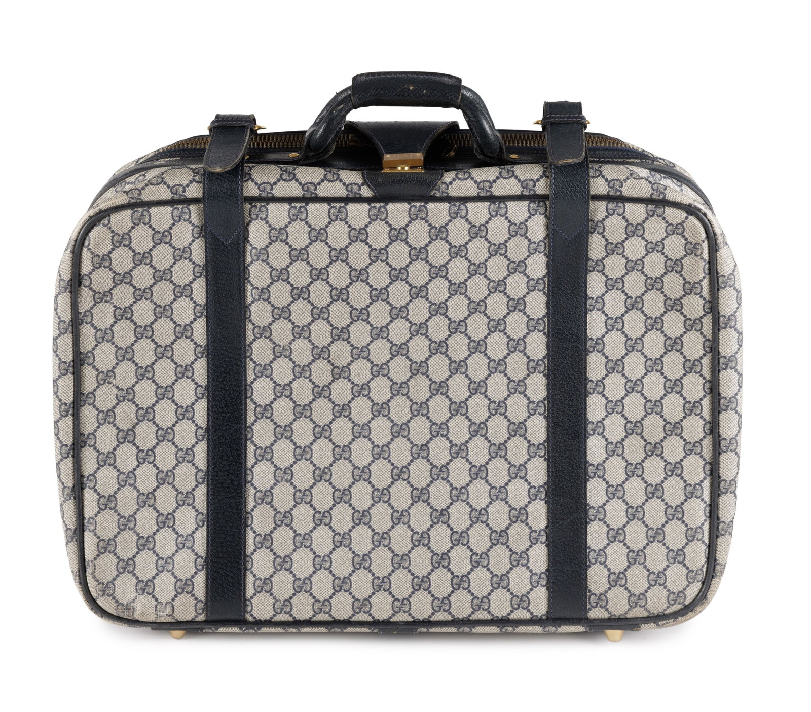 Gucci, valise souple en toile enduite Guccissma et cuir bleu marine, 33x50 cm: Gucci, valise souple en toile enduite Guccissma et cuir bleu marine, 33x50 cm Condition Bon état de conservation général Intérieur propre Les courroies et finitions en cuir