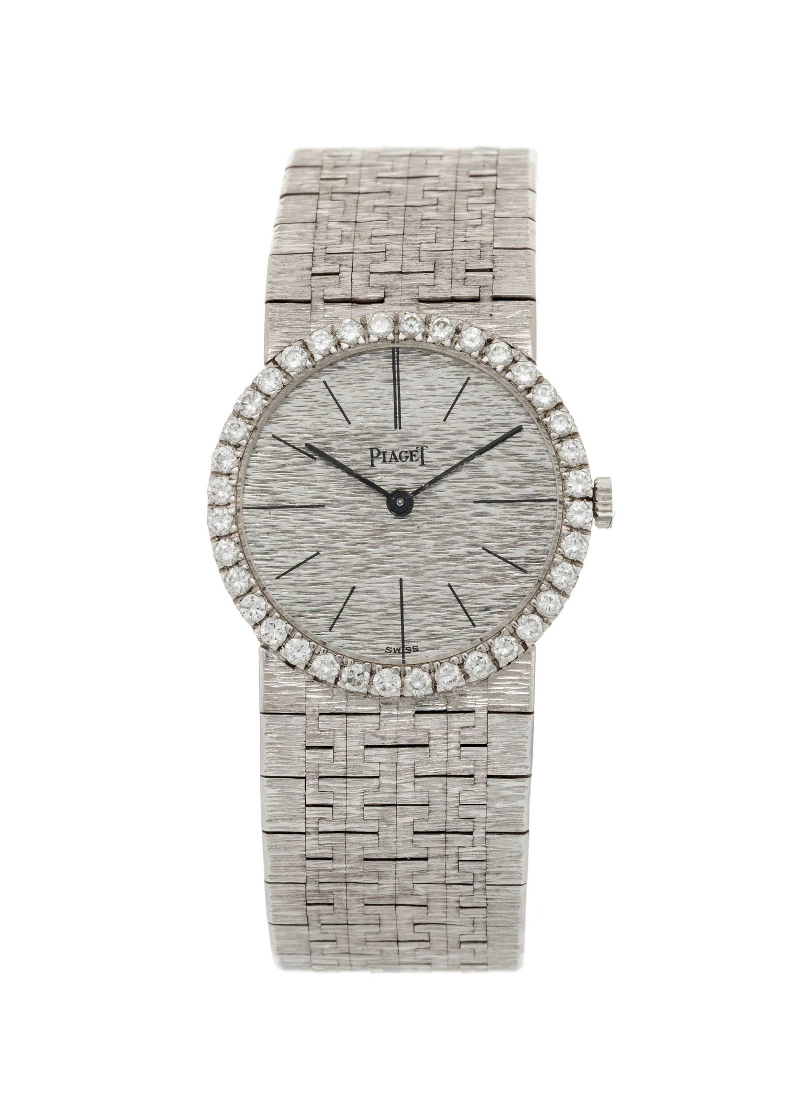 Piaget, réf. 926 A 6, montre-bracelet en or gris 750 sertie de diamants Mouvement: cal. 9P, m: Piaget, réf. 926 A 6, montre-bracelet en or gris 750 sertie de diamants Mouvement: cal. 9P, mécanique, 18 rubis, n°632324 Boîtier: n°85052, diam. 24 mm Signature: cadran,