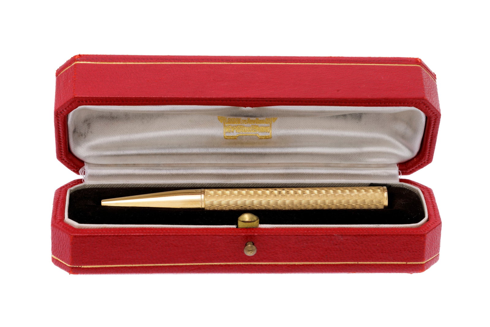 Cartier, porte-mine en or 750 à décor guilloché, signé, numéroté 06215 - 4