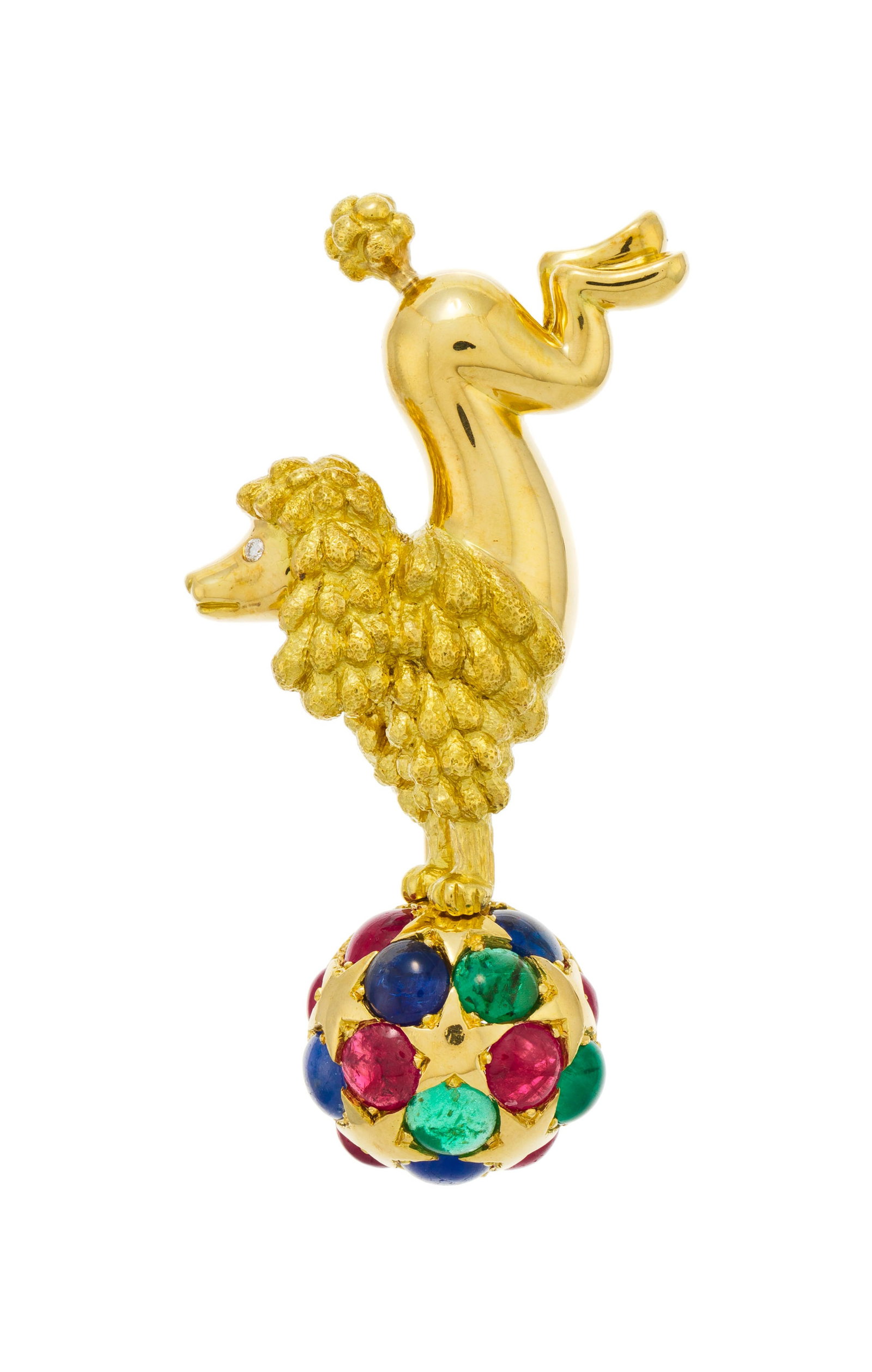 Chaumet, broche en or 750 figurant un caniche sur un ballon de cirque à motif étoilé : Chaumet, broche en or 750 figurant un caniche sur un ballon de cirque à motif étoilé serti de cabochons de saphirs, rubis et émeraudes, l'œil serti d'un petit diamant taille b
