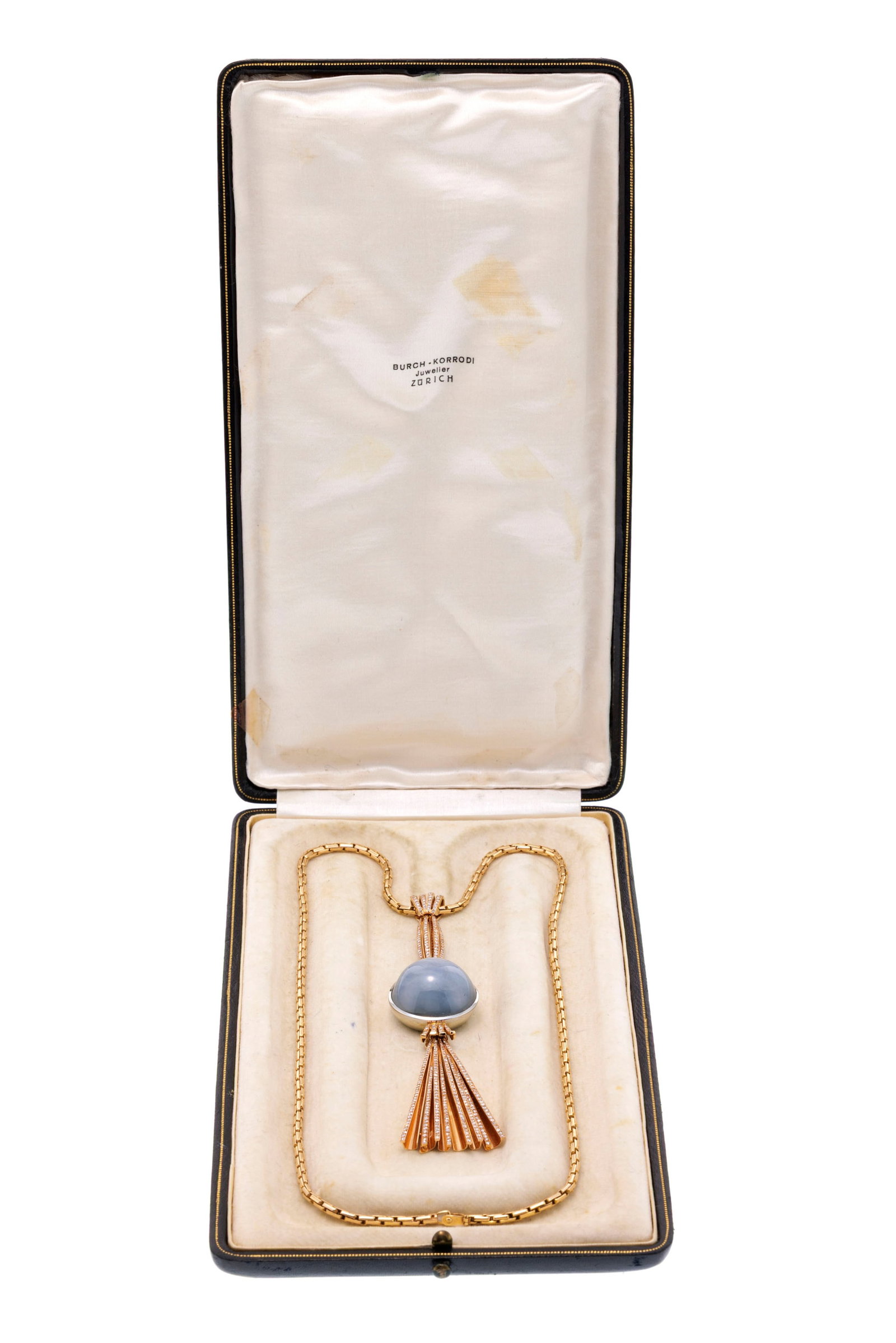 Pendentif comète circa 1945 or rose 750 serti d'un saphir étoilé bleu-gris (env. 120  - 4