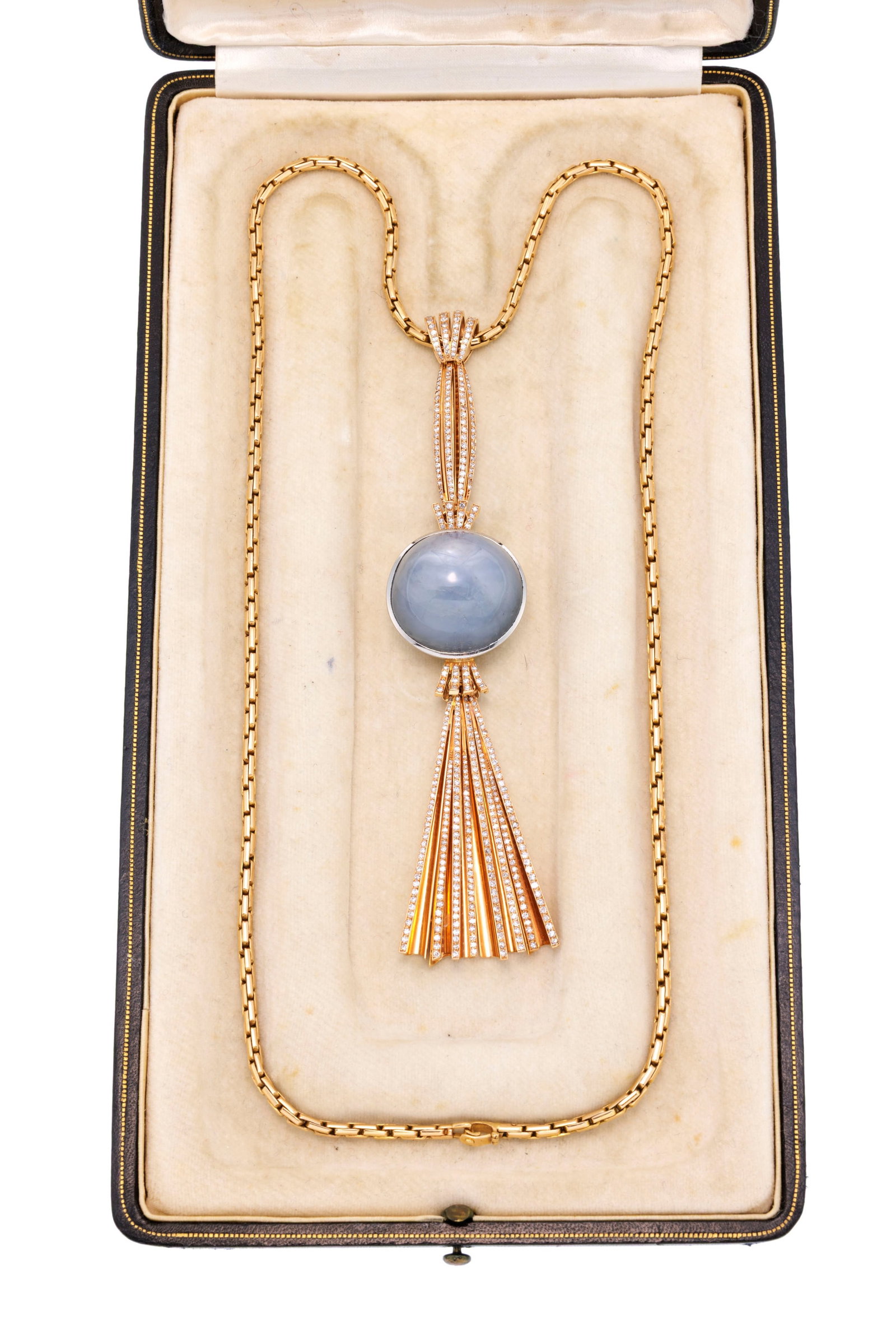 Pendentif comète circa 1945 or rose 750 serti d'un saphir étoilé bleu-gris (env. 120  - 5