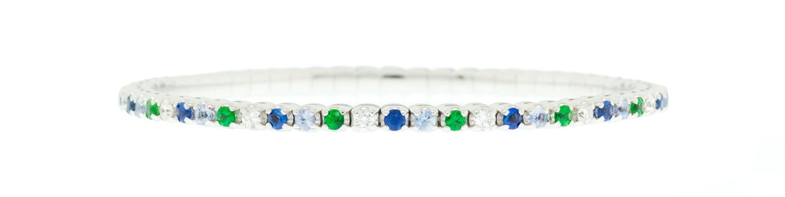 Piero Milano, bracelet extensible or gris 750 serti de saphirs, de tsavorites et de diamants taille : Piero Milano, bracelet extensible or gris 750 serti de saphirs, de tsavorites et de diamants taille brillant, signé, circ. 17 cm, 15g Condition Très bon état de conservation