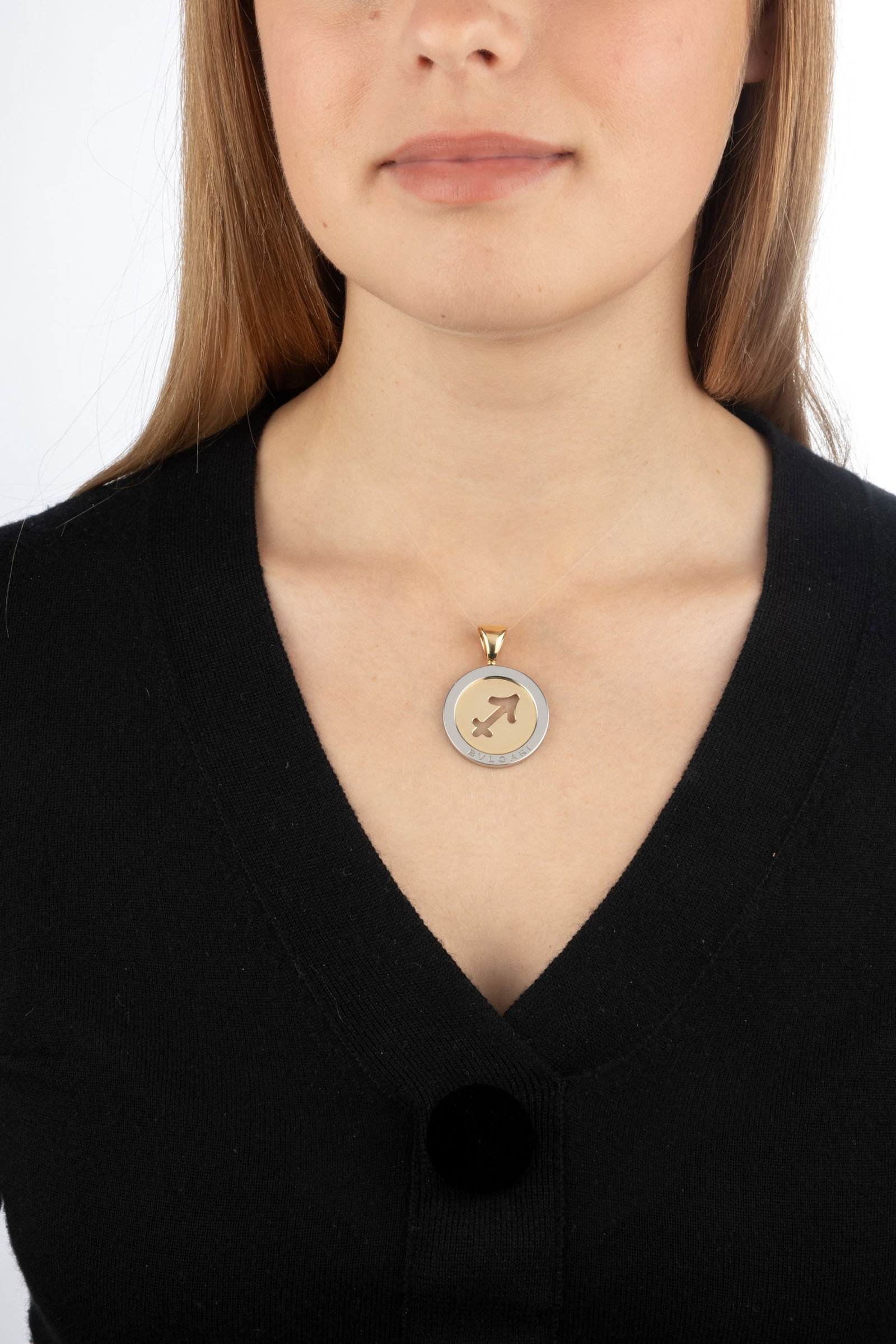 Bulgari, pendentif or 750 et acier ajouré du symbole du sagittaire, signé, h. 4.3 cm, 13g, - 4